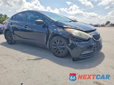 Czwarte zdjęcie samochodu z boku: 2014 KIA FORTE LX VIN:KNAFX4A65E5253032 - miniatura