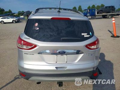 Zdjęcie 6 z 12 samochodu: 2016 FORD ESCAPE TITANIUM VIN:1FMCU9J90GUC26766 - miniatura