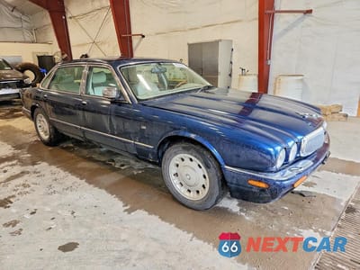 Czwarte zdjęcie samochodu z boku: 1998 JAGUAR VANDENPLAS VIN:SAJKN6246WC853007 - miniatura