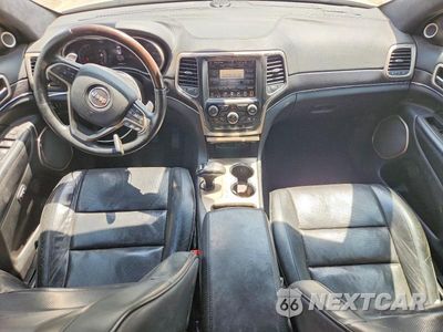 Zdjęcie 8 z 13 samochodu: 2014 JEEP GRAND CHEROKEE SUMMIT VIN:1C4RJEJT2EC359592 - miniatura