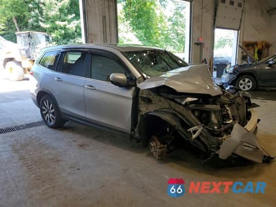 Czwarte zdjęcie samochodu z boku: 2022 HONDA PILOT EXL VIN:5FNYF6H59NB011012 - miniatura