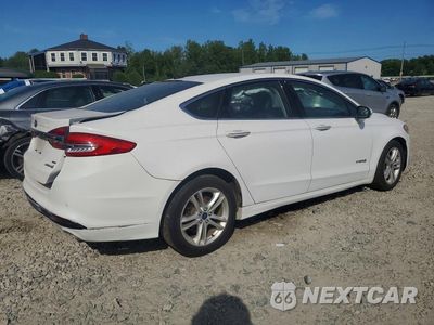 Trzecie zdjęcie samochodu z tyłu: 2018 FORD FUSION SE HYBRID VIN:3FA6P0LU0JR163517 - miniatura