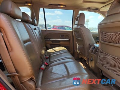 Zdjęcie 11 z 13 samochodu: 2005 HONDA PILOT EXL VIN:5FNYF18535B059902 - miniatura