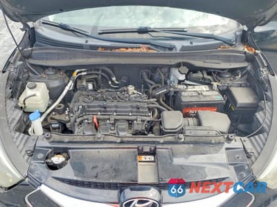 Zdjęcie 12 z 13 samochodu: 2015 HYUNDAI TUCSON LIMITED VIN:KM8JU3AG7FU952237 - miniatura
