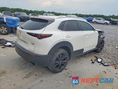 Trzecie zdjęcie samochodu z tyłu: 2022 MAZDA CX-30 VIN:3MVDMBAY3NM437886 - miniatura