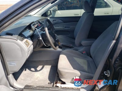 Zdjęcie 7 z 12 samochodu: 2004 MITSUBISHI LANCER ES VIN:JA3AJ26E04U030340 - miniatura