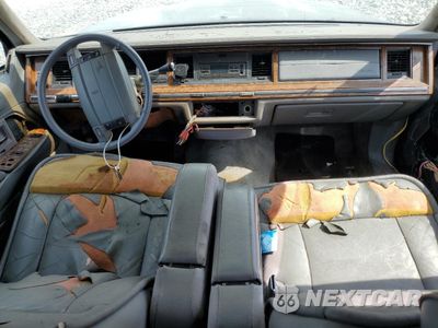 Zdjęcie 15 z 26 samochodu: 1994 LINCOLN TOWN CAR CARTIER VIN:1LNLM83W8RY732046 - miniatura