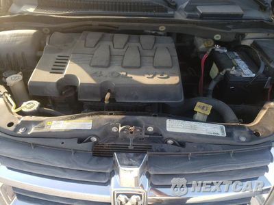 Zdjęcie 12 z 13 samochodu: 2009 DODGE GRAND CARAVAN SXT VIN:2D8HN54X49R591544 - miniatura