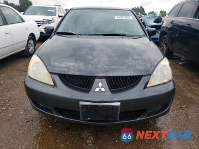 Piąte zdjęcie samochodu w środku: 2004 MITSUBISHI LANCER ES VIN:JA3AJ26E04U030340 - miniatura