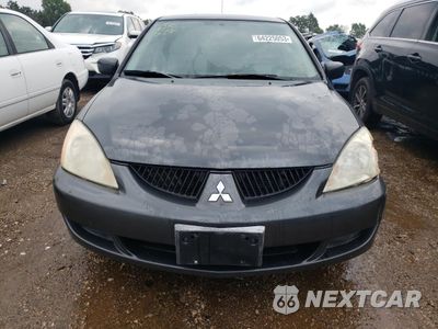 Piąte zdjęcie samochodu w środku: 2004 MITSUBISHI LANCER ES VIN:JA3AJ26E04U030340 - miniatura