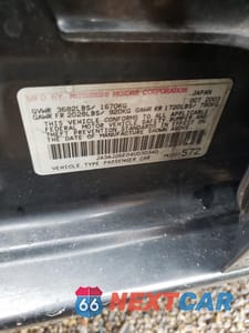 Zdjęcie 12 z 12 samochodu: 2004 MITSUBISHI LANCER ES VIN:JA3AJ26E04U030340 - miniatura