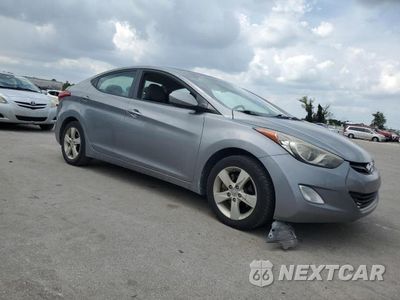 Czwarte zdjęcie samochodu z boku: 2012 HYUNDAI ELANTRA GLS VIN:KMHDH4AE4CU442459 - miniatura