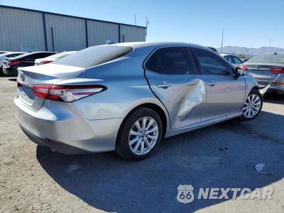 Trzecie zdjęcie samochodu z tyłu: 2019 TOYOTA CAMRY L VIN:4T1B11HK6KU806031 - miniatura