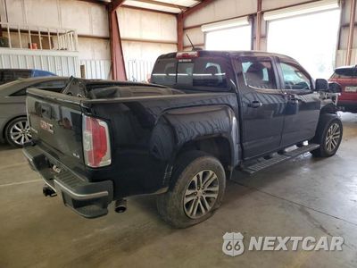 Trzecie zdjęcie samochodu z tyłu: 2016 GMC CANYON VIN:1GTG5CEA3G1114484 - miniatura