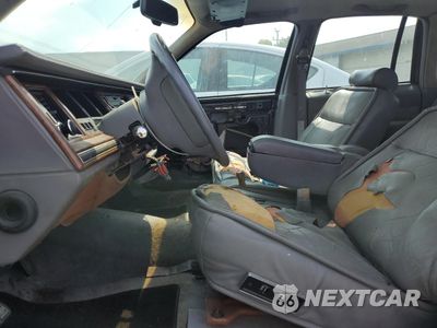 Zdjęcie 13 z 26 samochodu: 1994 LINCOLN TOWN CAR CARTIER VIN:1LNLM83W8RY732046 - miniatura