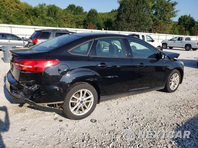 Trzecie zdjęcie samochodu z tyłu: 2016 FORD FOCUS SE VIN:1FADP3F26GL380659 - miniatura