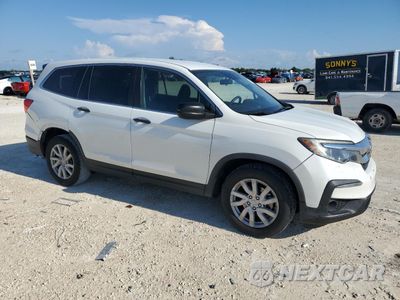 Czwarte zdjęcie samochodu z boku: 2020 HONDA PILOT LX VIN:5FNYF5H12LB028576 - miniatura