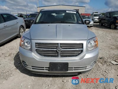 Piąte zdjęcie samochodu w środku: 2010 DODGE CALIBER SXT VIN:1B3CB4HA7AD661063 - miniatura