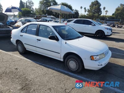 Czwarte zdjęcie samochodu z boku: 1996 NISSAN SENTRA E VIN:1N4AB41D3TC713040 - miniatura