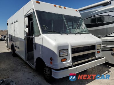 Czwarte zdjęcie samochodu z boku: 2001 FORD ECONOLINE E450 SUPER DUTY COMMERCIAL STRIPPED CHASSIS VIN:1FCLE49L21HB26009 - miniatura