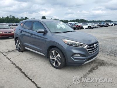 Czwarte zdjęcie samochodu z boku: 2017 HYUNDAI TUCSON LIMITED VIN:KM8J33A29HU422622 - miniatura