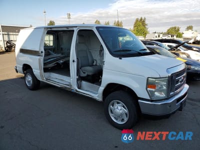 Czwarte zdjęcie samochodu z boku: 2011 FORD ECONOLINE E150 VAN VIN:1FTNE1EWXBDA59191 - miniatura