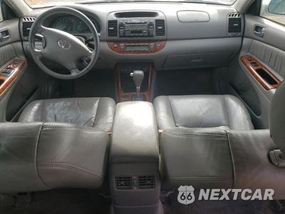 Zdjęcie 8 z 12 samochodu: 2002 TOYOTA CAMRY LE VIN:JTDBF30KX20001377 - miniatura
