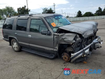 Czwarte zdjęcie samochodu z boku: 1999 GMC YUKON VIN:1GKEK13R9XJ757780 - miniatura