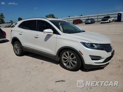 Czwarte zdjęcie samochodu z boku: 2017 LINCOLN MKC SELECT VIN:5LMCJ2C95HUL36501 - miniatura