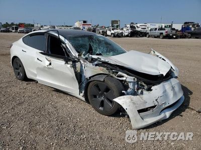 Czwarte zdjęcie samochodu z boku: 2021 TESLA MODEL 3 VIN:5YJ3E1EA7MF907843 - miniatura