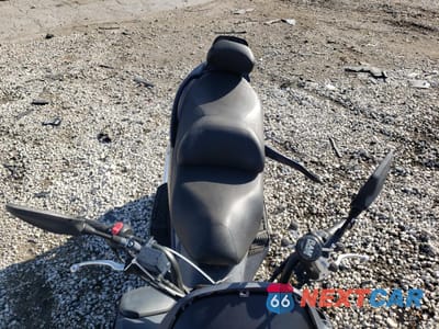 Piąte zdjęcie samochodu w środku: 2004 SUZUKI AN400 K3 VIN:JS1CK43A942100427 - miniatura