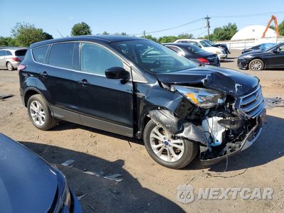 Czwarte zdjęcie samochodu z boku: 2017 FORD ESCAPE SE VIN:1FMCU9GD4HUF00595 - miniatura