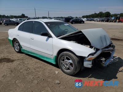 Czwarte zdjęcie samochodu z boku: 1999 MITSUBISHI GALANT ES VIN:4A3AA46G0XE158541 - miniatura