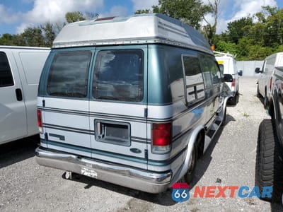 Trzecie zdjęcie samochodu z tyłu: 1996 FORD ECONOLINE E150 VAN VIN:1FDEE14H2THA14061 - miniatura
