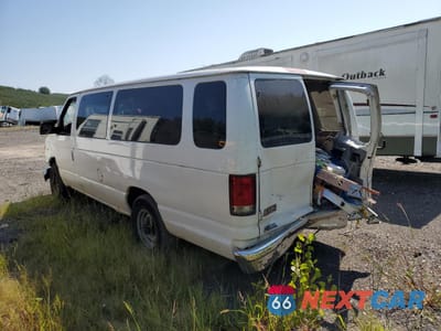 Trzecie zdjęcie samochodu z tyłu: 2001 FORD ECONOLINE E350 SUPER DUTY WAGON VIN:1FBSS31L31HA29965 - miniatura