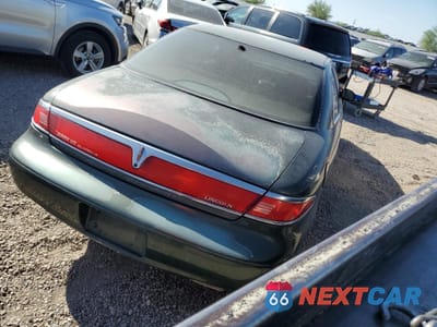 Trzecie zdjęcie samochodu z tyłu: 1995 LINCOLN MARK VIII VIN:1LNFM91V2WY629049 - miniatura