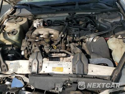 Zdjęcie 11 z 12 samochodu: 2001 CHEVROLET LUMINA VIN:2G1WL52J111281566 - miniatura
