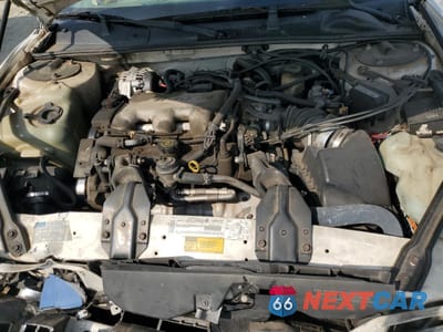 Zdjęcie 12 z 13 samochodu: 2001 CHEVROLET LUMINA VIN:2G1WL52J111281566 - miniatura
