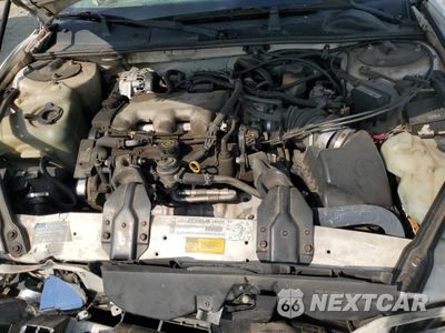 Zdjęcie 12 z 13 samochodu: 2001 CHEVROLET LUMINA VIN:2G1WL52J111281566 - miniatura
