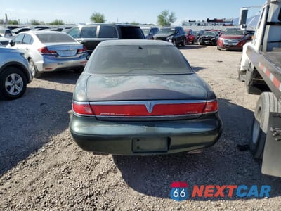 Zdjęcie 6 z 12 samochodu: 1995 LINCOLN MARK VIII VIN:1LNFM91V2WY629049 - miniatura