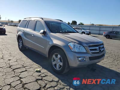 Czwarte zdjęcie samochodu z boku: 2007 MERCEDES-BENZ GL 450 4MATIC VIN:4JGBF71E27A171049 - miniatura