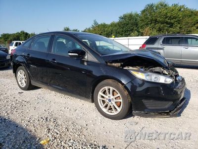 Czwarte zdjęcie samochodu z boku: 2016 FORD FOCUS SE VIN:1FADP3F26GL380659 - miniatura