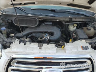 Zdjęcie 12 z 13 samochodu: 2016 FORD TRANSIT T-150 VIN:1FTYE2CM3GKA38433 - miniatura