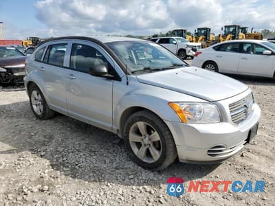 Czwarte zdjęcie samochodu z boku: 2010 DODGE CALIBER SXT VIN:1B3CB4HA7AD661063 - miniatura