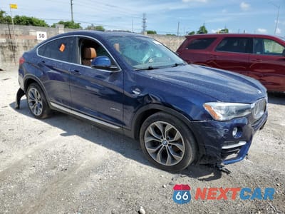 Czwarte zdjęcie samochodu z boku: 2015 BMW X4 XDRIVE35I VIN:5UXXW5C51F0E87821 - miniatura