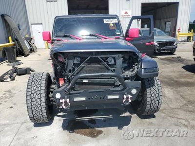 Piąte zdjęcie samochodu w środku: 2020 JEEP WRANGLER UNLIMITED SAHARA VIN:1C4HJXEN8LW204656 - miniatura