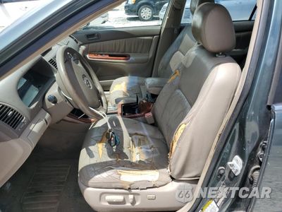 Zdjęcie 7 z 12 samochodu: 2004 TOYOTA CAMRY LE VIN:4T1BE32K54U373166 - miniatura