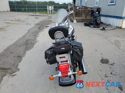 Czwarte zdjęcie samochodu z boku: 2003 SUZUKI VL800 VIN:JS1VS54A632106519 - miniatura