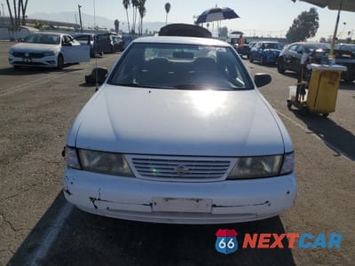 Piąte zdjęcie samochodu w środku: 1996 NISSAN SENTRA E VIN:1N4AB41D3TC713040 - miniatura