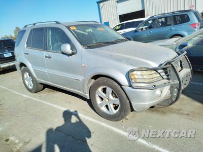 Czwarte zdjęcie samochodu z boku: 2001 MERCEDES-BENZ ML 320 VIN:4JGAB54E21A257959 - miniatura